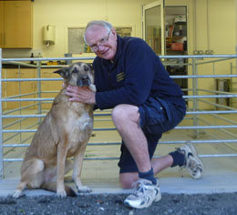 Graham Duncanson with a dog outside his practice