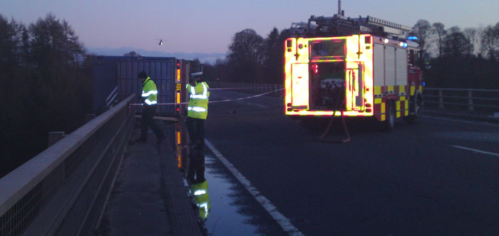 Scene of accident at dusk by John Blackwell